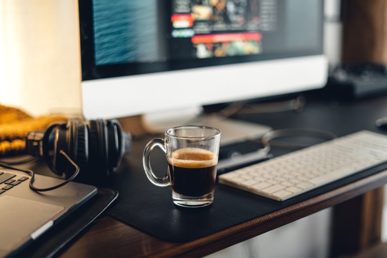 hot coffee on desk at home